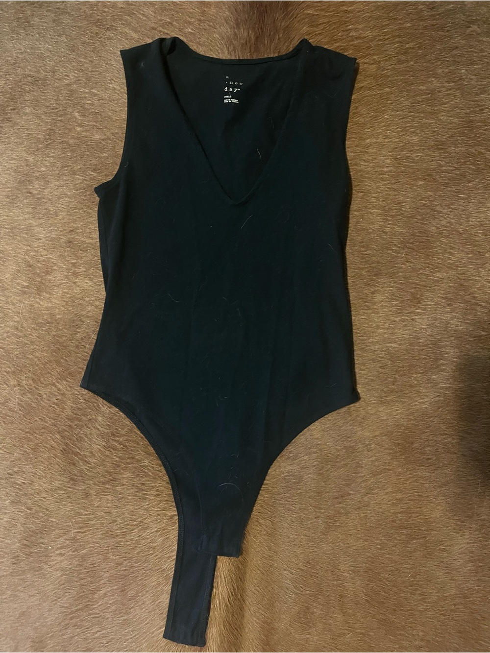 Black V-Neck Sleeveless One-Piece Bodysuit